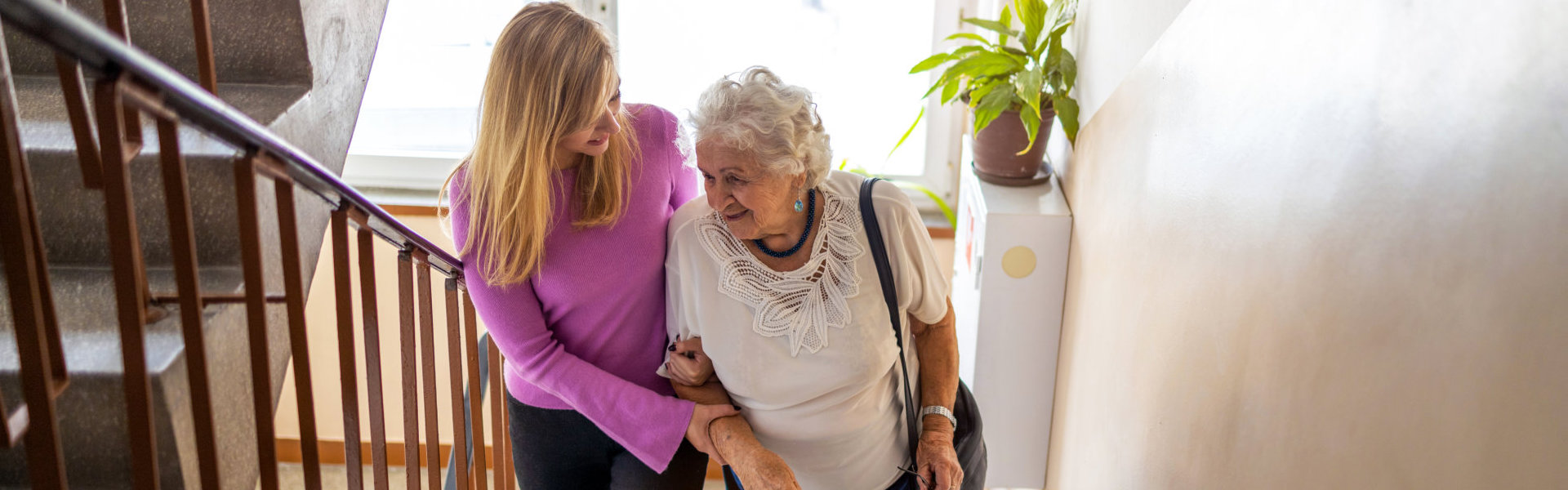 Caregiver helping elderly